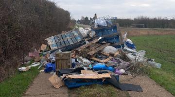 Large mound of rubbish from a skip